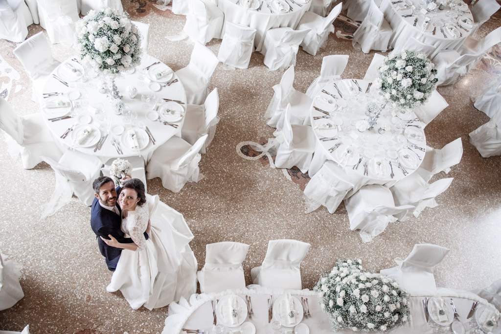 newlyweds dancing in the empty hall